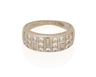 214
A Diamond Ring
Designed with five baguette and seventeen round brilliant-cut diamonds totaling approximately 0.95 carat, set in 14K white gold.
3.25 grams
Size: 5.5
Estimate: $500 - $700