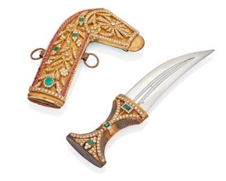 209
A Gem-Set Dagger
The hilt features 3 rectangular step-cut emeralds with the largest gauged at 8.3 x 5.7 mm further set with 94 circular-cut and 4 emerald-cut diamonds weighing approximately 17.00 carats. The sheath set with one large oval mixed cut emerald gauged at 11.3 x 8.84 mm further set with 3 step-cut emeralds, approximately 233 circular-cut diamonds weighing approximately 23.50 carats, and an additional 66 round and oval mixed-cut rubies gauged from 5.5 to 3.5 mm, set in gold and steel, 20th century.
Gross Weight of Dagger: 188.8 grams
Gross Weight of Sheath: 344.0 grams
10 1/2" L x 4 3/4" W x 22/25" D
Estimate: $9,000 - $12,000