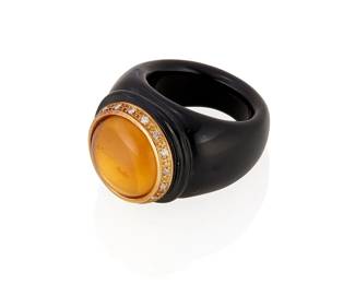 106
A Black Onyx And Citrine Ring
The black onyx ring set with a cabochon citrine measuring approximately 14.90 mm, within an 18K gold and round brilliant-cut diamond frame.
16.8 grams
Size: 8
Estimate: $600 - $800