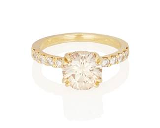 208
A Diamond Ring
Centering a round brilliant cut pinkish brown diamond measuring approximately 8.29 x 8.30 x 5.30 mm and weighing approximately 2.22 carats, highlighted with round brilliant-cut diamonds weighing approximately .25 carat, set in 18K gold.
4.0 grams
Size: 6.5
Estimate: $4,000 - $6,000