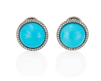 108
A Pair Of Turquoise And Diamond Earrings
Set with two turquoise cabochons, each measuring approximately 15.50 mm in diameter, within a frame of 165 rose-cut diamonds weighing .86 carat, set in 18K blackened gold.
2 pieces
12.10 grams
3/4" Dia.
Estimate: $1,500 - $2,000