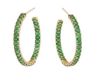 96
A Pair Of Tsavorite Garnet Hoop Earrings
Set to the front and back with 66 octagonal-shaped tsavorite garnets weighing 14.70 carats, in 18K gold.
2 pieces
13.1 grams
1 1/2" L x 1 3/8" W
Estimate: $4,000 - $6,000