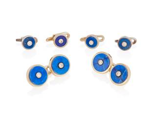 185
A Diamond, Lapis And Gold Dress Set, Bulgari
The dress set comprising a pair of double sided cufflinks featuring round lapis disks centering bezel set round brilliant-cut diamonds, along with four similar studs, in 18K gold, signed Bulgari. Accompanied by a fitted leather Bulgari box.
6 pieces
23.9 grams
Cufflinks: 1/2" Dia. / Studs: 1/4" Dia.
Estimate: $2,500 - $3,500
