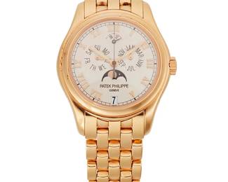 143
A Gold Triple Calendar And Moonphases Wristwatch, Patek Philippe
Ref: 5036/1R 001
Dial: White with luminescent gold Roman numerals and dart hands, aperture for date and moonphase at 6 o'clock, registers for power reserve at 12 o'clock, day and month registers at 9 and 3 o'clock
Movement: 37 jewel automatic movement number 3289248, calibre 315 with gold rotor
Case: 38 mm, 18K rose gold with flush set complication activators and exhibition view back.
Bracelet: 18K rose gold bracelet with double deployant clasp and flip lock, 7 1/2" L
Accompanied by original box, setting tool and pamphlets.
153.8 grams
Estimate: $25,000 - $35,000