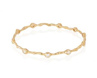 202
A Diamond Bangle
With 10 collet-set round brilliant-cut diamonds weighing 1.50 carats, mounted in 18K gold.
13.1 grams
2 1/2" D
Estimate: $2,000 - $3,000