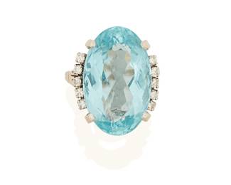 42
An Aquamarine And Diamond Ring
Centering a oval-shaped aquamarine measuring approximately 22.34 x 14.38 x 9.74 mm and weighing approximately 17.20 carats, flanked on either side by a total of 10 round brilliant-cut diamonds weighing approximately 0.20 carat, set in 14K white gold.
11.1 grams
Size: 6.5
Estimate: $3,000 - $5,000