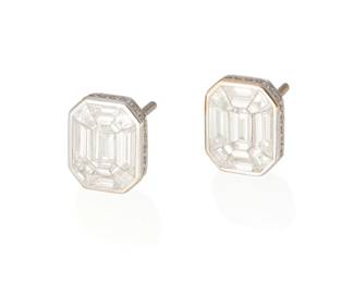 159
A Pair Of Diamond Earrings
Set with 70 round brilliant-cut, trapezoid and baguette-shaped diamonds weighing 2.02 carats, within an 18K white gold octagonal frame.
2 pieces
4.70 grams
1/4" L x 1/4" W
Estimate: $4,500 - $6,500