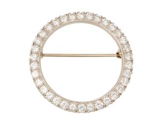 45
A Diamond Brooch
The circular brooch set with 34 round brilliant-cut diamonds weighing approximately 2.29 carats, in platinum.
9.20 grams
1 1/4" Dia.
Estimate: $1,000 - $1,500