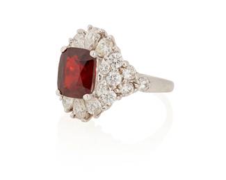 160
A Spinel And Diamond Ring
Set with a cushion-shaped spinel measuring approximately 9.02 x 7.64 x 5.01 mm and weighing approximately 3.00 carats, highlighted by six pear-shaped diamonds weighing a total of approximately .48 carat and 16 round brilliant-cut diamonds weighing a total of approximately .72 carat, in 14K white gold.

Accompanied by GFCO Gem Lab report number AA26899C stating that the spinel has no indications of heat treatment.
5.00 grams
Size: 6 1/4
Estimate: $2,500 - $3,500