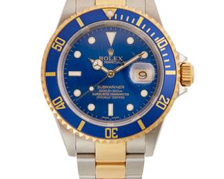 142
A Submariner Wristwatch, Rolex
Ref: 16613
Serial: F183476
Dial: blue sunburst dial, gold Mercedes hands
Movement: Rolex cal. 3135, self-winding, 31 jewels
Case: 40 mm stainless steel, 18k yellow gold bezel
Bracelet: Rolex Oyster band, stainless steel/18K gold, 6" Dia.
Signed: dial, case, movement, bracelet.
Includes Rolex chronometer certification, instructions, hang tag, and Rolex green leather box
Estimate: $9,000 - $12,000
