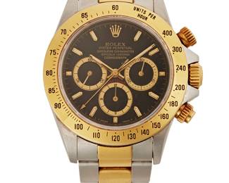 140
A 'Daytona' Cosmograph Wristwatch, Rolex
Ref: 16523
Serial: X625013
Dial: Black with tritium hands
Movement: Automatic 4030 Zenith movement
Case: 40mm, stainless steel with an 18K gold bezel and
Bracelet: stainless steel, with 18K gold, 8 1/4" L
Includes Rolex chronometer certification, Rolex serial number hang tag, service guide and wooden box.
Estimate: $20,000 - $30,000