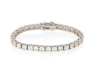 197
A Diamond Line Bracelet
Set with 31 round brilliant-cut diamonds weighing approximately 15.50 carats, in 14K white gold.
22.10 grams
7" L
Estimate: $13,000 - $18,000