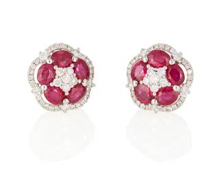 54
A Pair Of Ruby And Diamond Earrings
Set with 10 oval-shaped rubies weighing 2.30 carats, highlighted by 72 round brilliant-cut diamonds weighing a total of .54 carat, in 18K white gold.
2 pieces
5 grams
3/8" Dia.
Estimate: $1,200 - $1,500