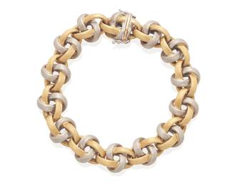 34
A Bi-Color Gold Bracelet
The bracelet is designed as alternating yellow and white gold links with a Florentine finish, in 18K gold, stamped Italy.
42.82 grams
7 3/4" L x 1/2" W
Estimate: $1,800 - $2,200