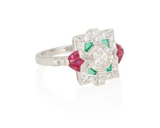 52
A Diamond, Ruby, Emerald And Gold Ring
The ring centers one round brilliant-cut diamond weighing 1.03 carats, highlighted with four trapezoid-cut and six modified shield-shaped rubies and further enhanced with 12 round brilliant-cut diamonds weighing a total of approximately .30 carat, in 18K gold.
4.91 grams
Size 7
Estimate: $800 - $1,200