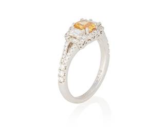 225
A Colored Diamond Ring
Set with a cushion modified brilliant-cut fancy vivid yellowish orange diamond measuring 5.32 x 4.17 x 2.60 mm and weighing .54 carat.

Accompanied by GIA report number 5171976795 stating that the diamond is Fancy Vivid Yellowish Orange, Natural Color, SI1 clarity.
5.5 grams
Size: 6.25
Estimate: $12,000 - $15,000