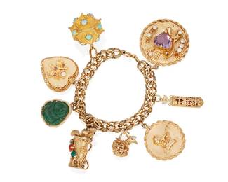 207
A Gold Charm Bracelet
The bracelet suspends eight charms, all with different motifs, six set with various gemstones, in 14K gold.
88.8 grams
7 1/4" L
Estimate: $3,500 - $4,500