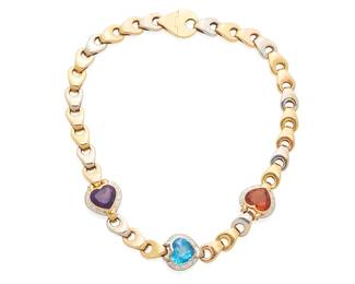 181
A Citrine, Topaz, Amethyst, Diamond And Gold Necklace
The necklace features a heart-shaped citrine measuring approximately 12.70 x 15.24 x 9.30 mm and weighing approximately 9.00 carats, a heart-shaped blue topaz measuring approximately 12.70 x 15.24 x 9.00 mm and weighing approximately 12.00 carats and a heart-shaped amethyst measuring approximately 12.70 x 15.24 x 9.00 mm and weighing approximately 9.00 carats, all bezel set and surrounded by channel set baguette-cut diamonds weighing a total of approximately 2.34 carats, completed by a fancy 18K yellow and white gold chain.
75.84 grams
16 1/2" L
Estimate: $4,000 - $6,000