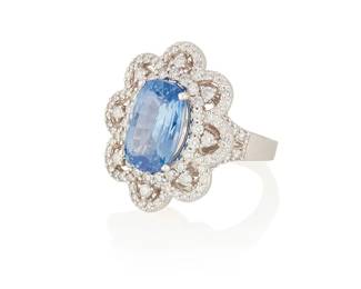 39
A Sapphire And Diamond Ring
Set with an oval-shaped sapphire measuring approximately 14.17 x 9.55 x 6.67 mm and weighing approximately 7.70 carats, surrounded by 102 round brilliant-cut diamonds weighing approximately 1.86 carats, in 18K white gold.

Accompanied by AGL report number 1119318 stating that the sapphire is of Ceylon origin, with no indications of heat treatment.
15.42 grams
Size: 6.75
Estimate: $5,000 - $7,000