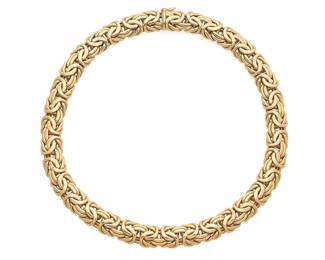 36
A Gold Necklace
Designed as a series of woven segments in 14K gold.
74.79 grams
17 1/2" L x 1/2" W
Estimate: $3,000 - $5,000