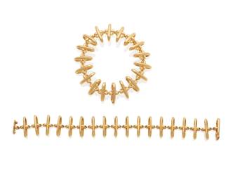 219
A Gold Necklace/Bracelet Combination, Poiray
May be worn as a necklace or converted into 2 bracelets, in 18K gold, stamped with maker's mark, numbered, signed Poiray.
2 pieces
147.26 grams
Necklace: 16" L; Bracelets: 8" L each
Estimate: $7,000 - $10,000