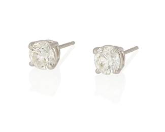 174
A Pair Of Diamond, Platinum And Gold Earrings
Set with a pair of round brilliant-cut diamonds weighing .70 carat and .72 carats, in platinum and 18K white gold.
2 pieces
2.50 grams
Estimate: $2,500 - $3,500