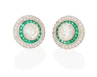83
A Pair Of Emerald, Diamond And Gold Earrings
Each set with a round brilliant-cut diamond weighing either 1.07 carats or 1.04 carats, surrounded by a total of 36 tapered baguette-cut emeralds and 56 round brilliant-cut diamonds totaling approximately 2.36 carats, set in 18K white gold.
2 pieces
6.1 grams
1/2" Dia.
Estimate: $1,800 - $2,200