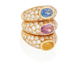 101
A Multicolored Sapphire And Diamond Ring
The ring centers bezel set yellow, pink and blue sapphires each measuring approximately 7.5 x 5.3 x 3.4 mm and further set with 108 round brilliant-cut diamonds weighing approximately 4.50 carats set in 18K gold.
15.7 grams
Ring Size: 5
Estimate: $3,000 - $5,000