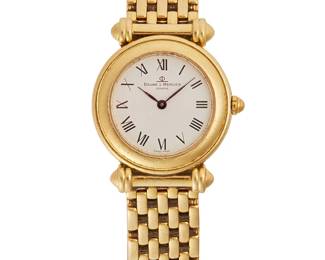 117
A Lady's Gold Watch, Baume & Mercier
Ref: 2362689
Dial: White with Roman numerals, feuille hands
Movement: Quartz
Case: 25mm 14K gold round, number MVO45132
Bracelet: Brick link with foldover clasp, 7 1/2" L
57.5 grams
Estimate: $800 - $1,200
