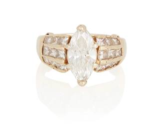 156
A Diamond Ring
Featuring a marquise-shaped diamond measuring approximately 11.54 x 7.39 x 4.18 mm and weighing approximately 1.50 carats, accented by 18 princess-cut diamonds weighing approximately .65 carat, set in 14K gold.
5.2 grams
Size: 6.5
Estimate: $2,500 - $3,500