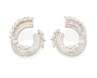 167
A Pair Of Diamond And Platinum Earrings
Set with 28 marquise-shaped diamonds weighing 5.77 carats and 144 baguette-shaped diamonds weighing 5.39 carats, mounted in platinum. Total diamond weight is 11.16 carats.
29.80 grams
1 1/8" L x 1 3/8" W
Estimate: $15,000 - $20,000