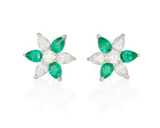 73
A Pair Of Emerald, Diamond And Platinum Earrings
Set with 6 pear-shaped diamonds weighing 1.87 carats alternating with 6 pear-shaped emeralds weighing 1.99 carats, centered by 2 round brilliant-cut diamonds weighing .62 carat, mounted in platinum and 18K white gold.
7.4 grams
5/8" Dia.
Estimate: $4,000 - $6,000