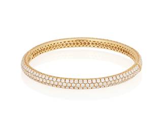 90
A Diamond Bangle
The bangle features 265 pavé-set round brilliant-cut diamonds weighing 7.77 carats, set in 18K gold.
19.2 grams
2 3/5" D
Estimate: $6,000 - $8,000