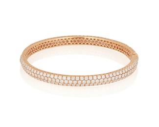 89
A Diamond Bangle
The bangle features 265 pavé-set round brilliant-cut diamonds weighing 7.46 carats, in 18K rose gold.
17.3 grams
2 5/8" D
Estimate: $6,000 - $8,000