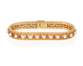 153
Ruby, Pearl, And Gold Bracelet, Shreve & Co.
Set with 24 circular-cut rubies weighing a total of approximately 1.44 carats and 24 cultured pearls measuring approximately 3.7 mm, in 18K gold, stamped Made in Italy and signed Shreve & Co.
34.10 grams
7 1/4" L
Estimate: $1,000 - $2,000