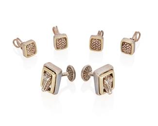 5
A Sterling Silver And Gold Dress Set, Kieselstein-Cord
The cufflinks are designed as three dimensional alligator heads looking through gold frames, with round circles with a moon and star motif on the opposite side, along with square studs featuring a braided alligator skin motif inside of gold frames, in sterling silver and 14K gold, signed KC for Kieselstein-Cord.
6 pieces
46 grams
Cufflinks: 3/4" H x 1/2" W; Studs: 5/8" H x 3/8" W
Estimate: $300 - $500