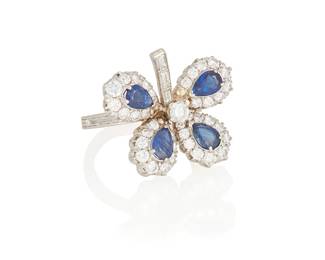 188
A Sapphire, Diamond, And Platinum Ring, Van Cleef & Arpels
Designed as a four leaf clover set with 4 pear-shaped sapphires weighing a total of approximately 1.26 carats, framed by 37 round brilliant-cut diamonds weighing approximately 1.69 carats, to the baguette-cut diamond stem and band weighing approximately .44 carat, in platinum, signed V.C.&A. for Van Cleef & Arpels, numbered 1170 S.O. for Special Order.
7.50 grams
Size: 6.5
Estimate: $3,000 - $5,000