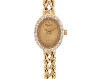 115
A Ladies Wristwatch, Movado
Ref: 62540
Dial: Gold tone with dot markers
Movement: Quartz
Case: 19 mm x 15 mm Oval 14K gold with single-cut diamonds, estimated 0.25 carat total weight, number 79256355
Bracelet: 14K gold, double rope chain link with foldover clasp, 6 3/4" Dia.
18.1 grams
Estimate: $300 - $500