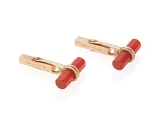 8
A Pair Of Carnelian And Gold Cufflinks, Tiffany & Co.
Designed as carved carnelian batons set in 14K gold, signed Tiffany & Co.
2 pieces
10.43 grams
3/4" L x 1/4" W
Estimate: $400 - $600
