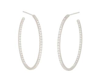 169
A Pair Of Diamond And Gold Earrings
The earrings are designed as hoops set to the front and back with 108 round brilliant-cut diamonds weighing 4.06 carats, mounted in 18K white gold.
2 pieces
12.92 grams
2" Dia.
Estimate: $4,000 - $6,000