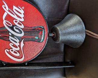 Cast iron coke bell and sign