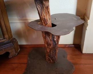 ARTIST HAND CARVED METAL TABLE