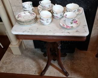 EASTLAKE MARBLE TOP TABLE AND CHINA