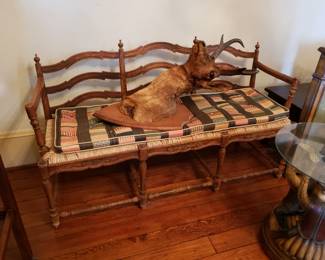 SETTEE WITH RUSH SEAT AND STAG HEAD