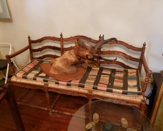 SETTEE WITH RUSH WOVEN SEAT AND STAG HEAD