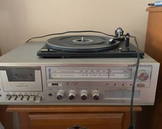 1970s all-in-one stereo system with 8-track and cassette players and turntable