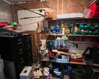 Storage room full of goodies, office supplies, tools, hardware, fishing gear, etc.