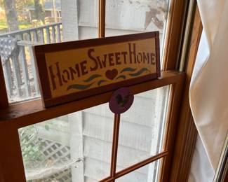 "Home sweet home" sign