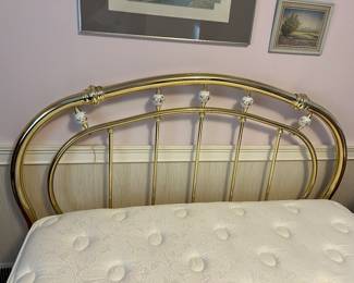 Brass headboard; queen adjustable bed