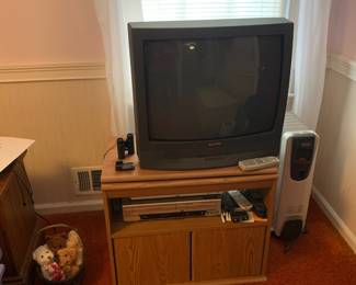 TV and stand; DeLonghi heater